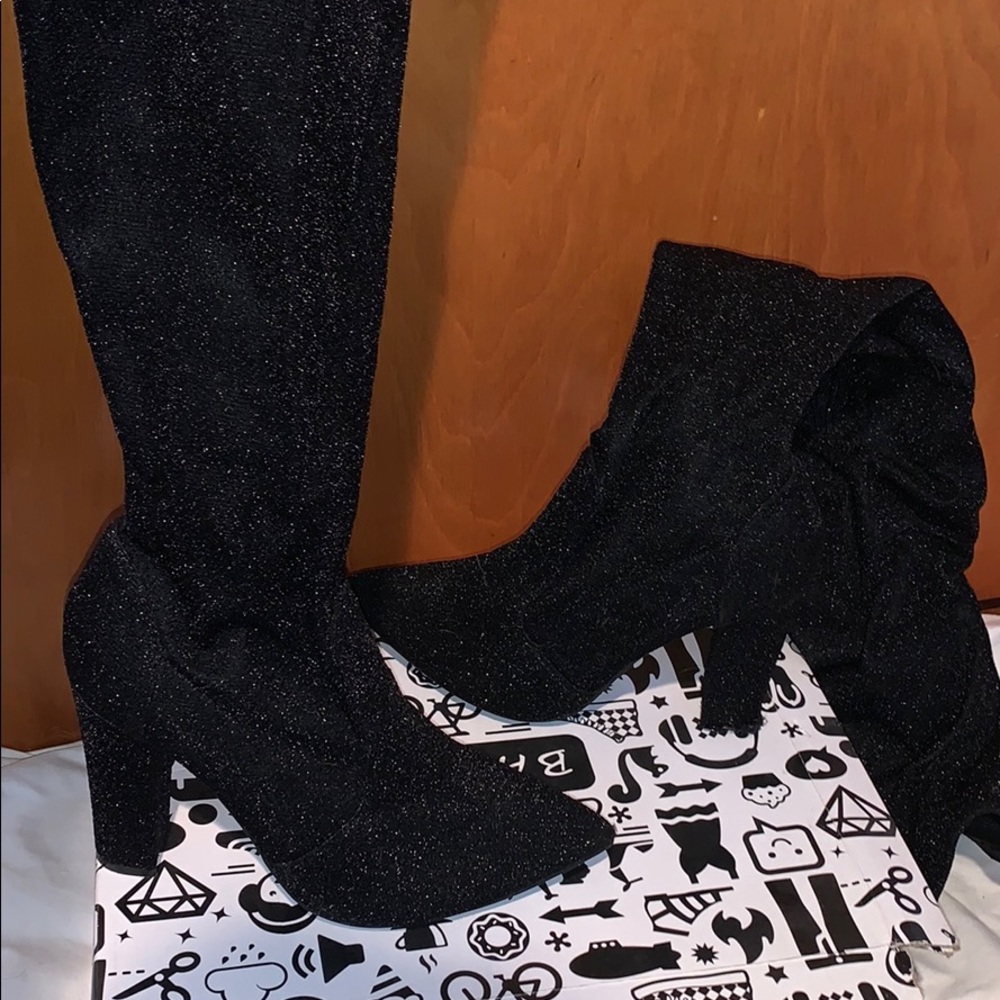 Thigh high sparky heels.